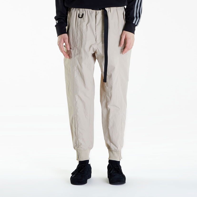 Hlače in kavbojke Y-3 Crinkle Nylon Cuffed Pants Siva | IV8024