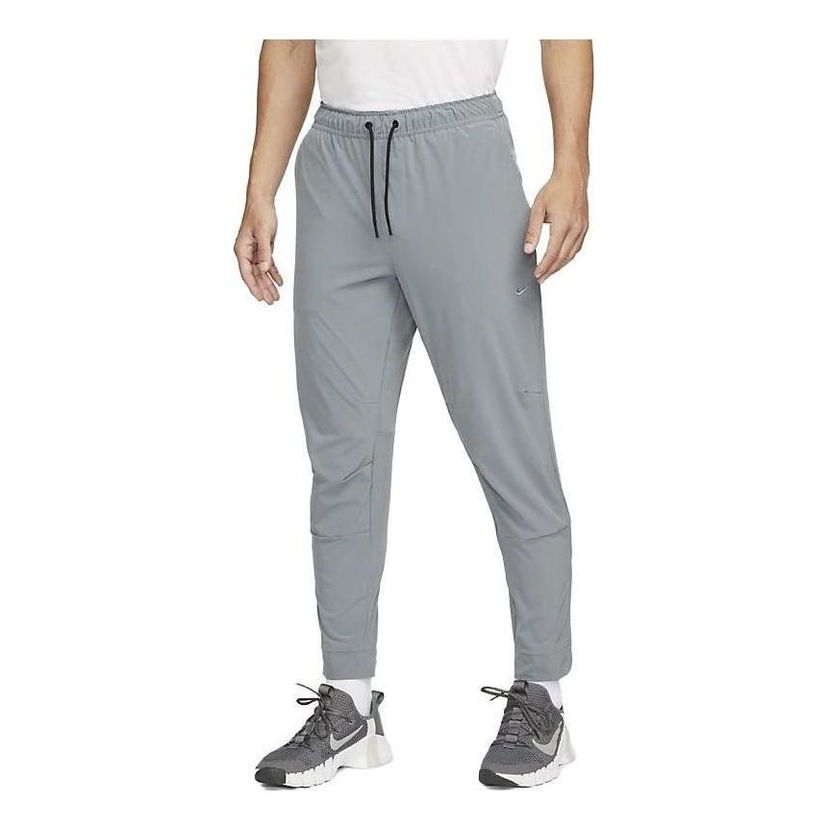 Trenirka Nike Zippered Cuff Versatile Training Pants Siva | FB7549-084
