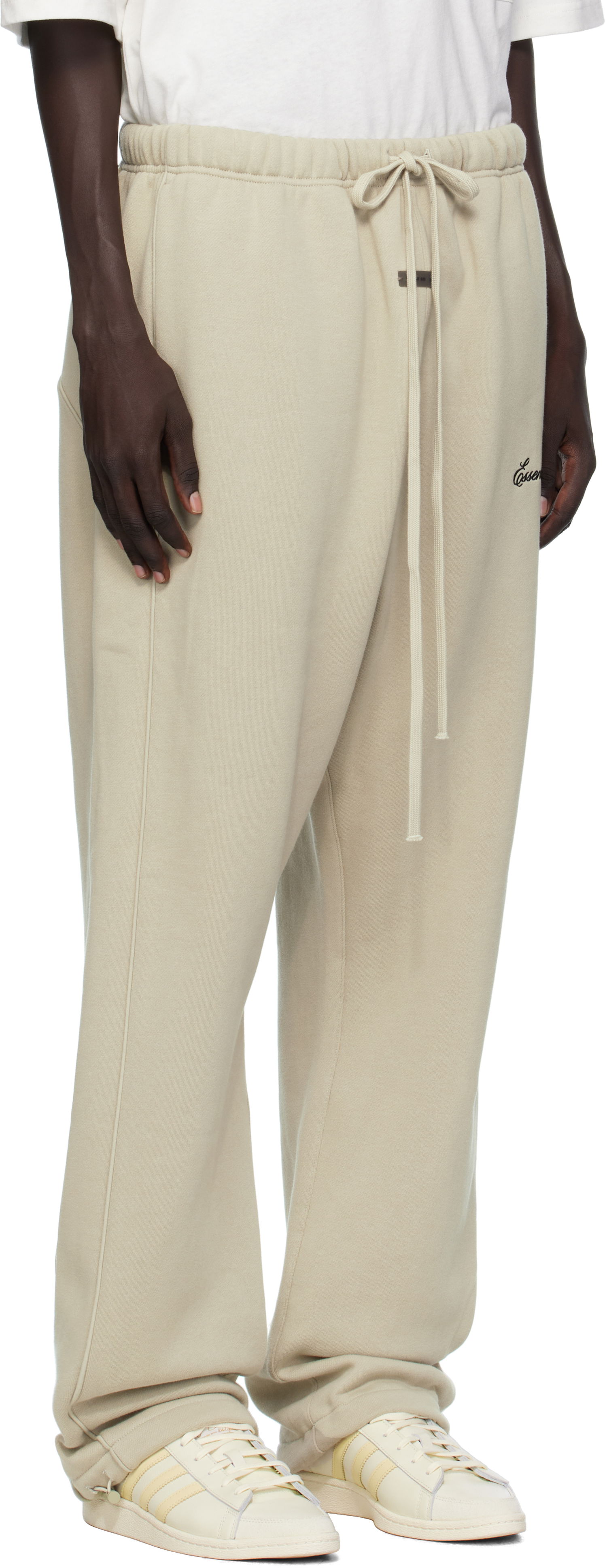 Trenirka Fear of God Fear of God ESSENTIALS Relaxed Fleece Piping Sweatpants Bež | 130SP258066F, 1