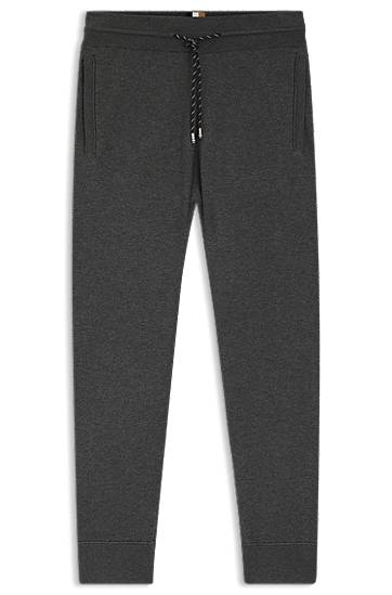 Trenirka BOSS Regular-fit tracksuit bottoms in cotton and virgin wool Siva | 50543154