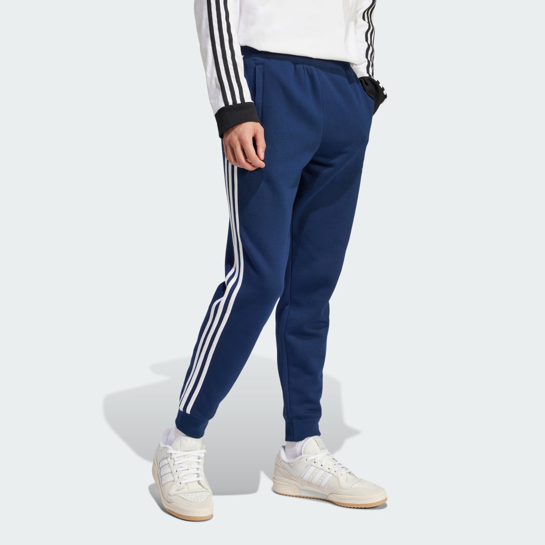 Trenirka adidas Performance Adicolor 3-Stripes Fleece Pants Modra | IM9319, 1