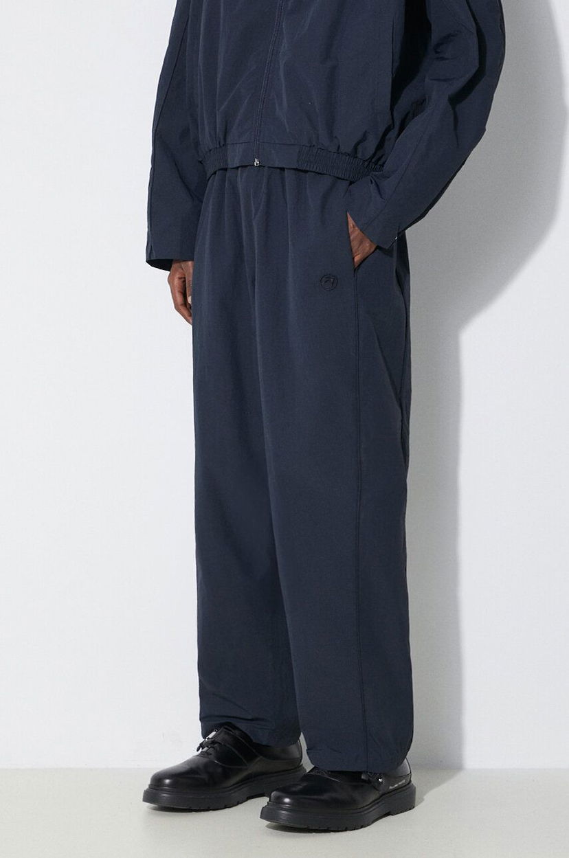 Hlače Ambush Track Pants Modra | BMCJ002S24FAB0014646