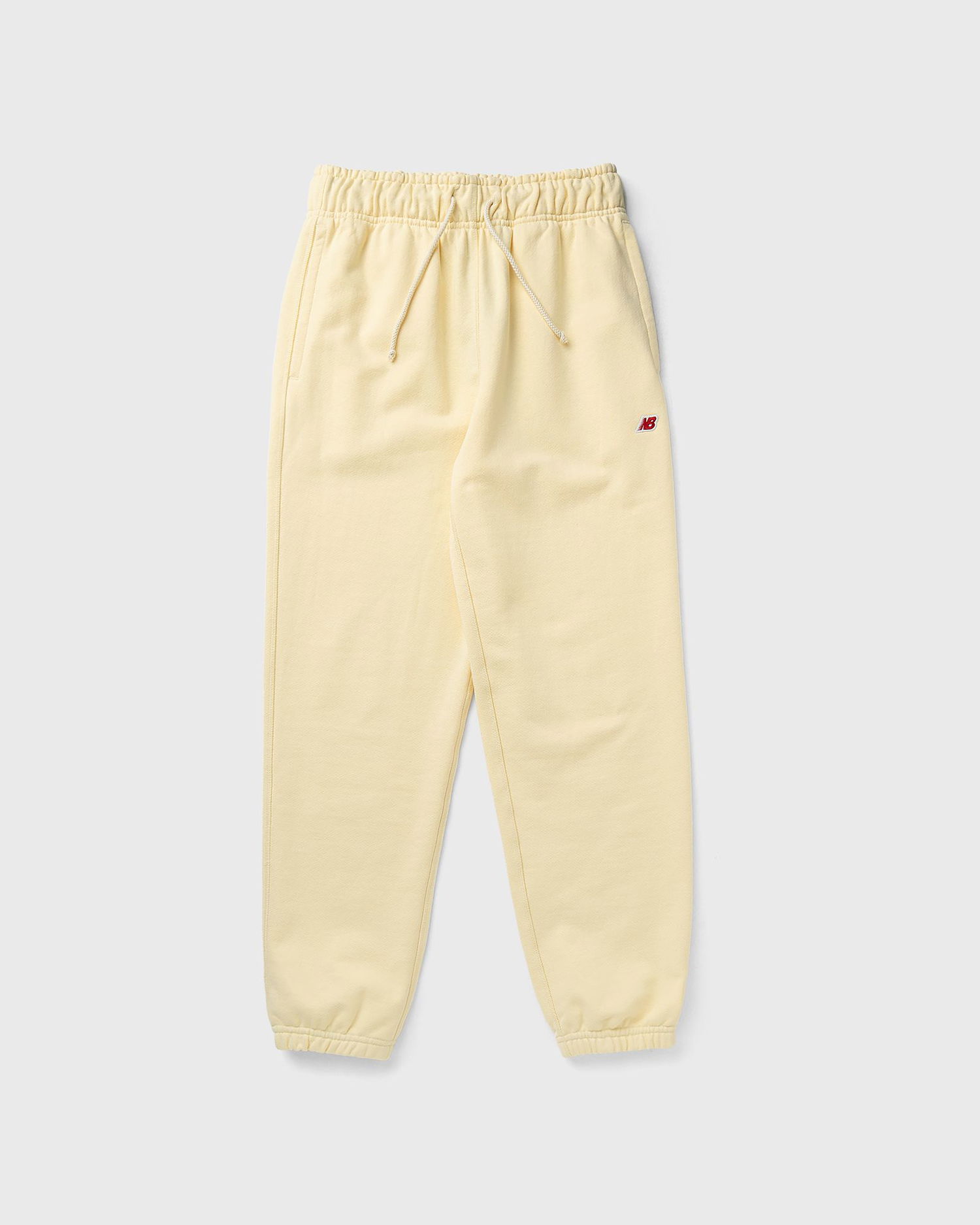 Trenirka New Balance Core Sweatpants Rumena | MP43547-CAU, 1