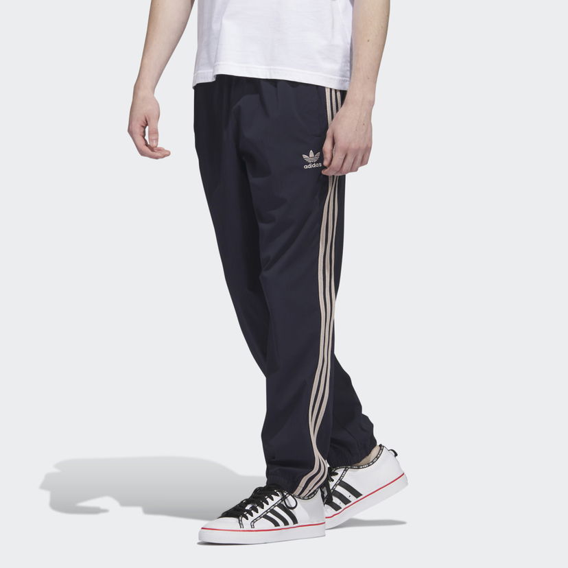 Trenirka adidas Performance Woven Track Pants Črna | IC5541