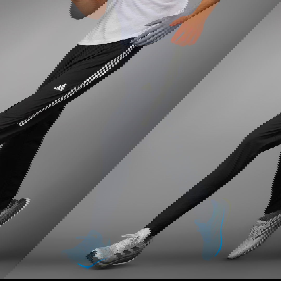 Trenirka adidas Performance Own the Run 3-Stripes Pants Črna | IK4982, 1