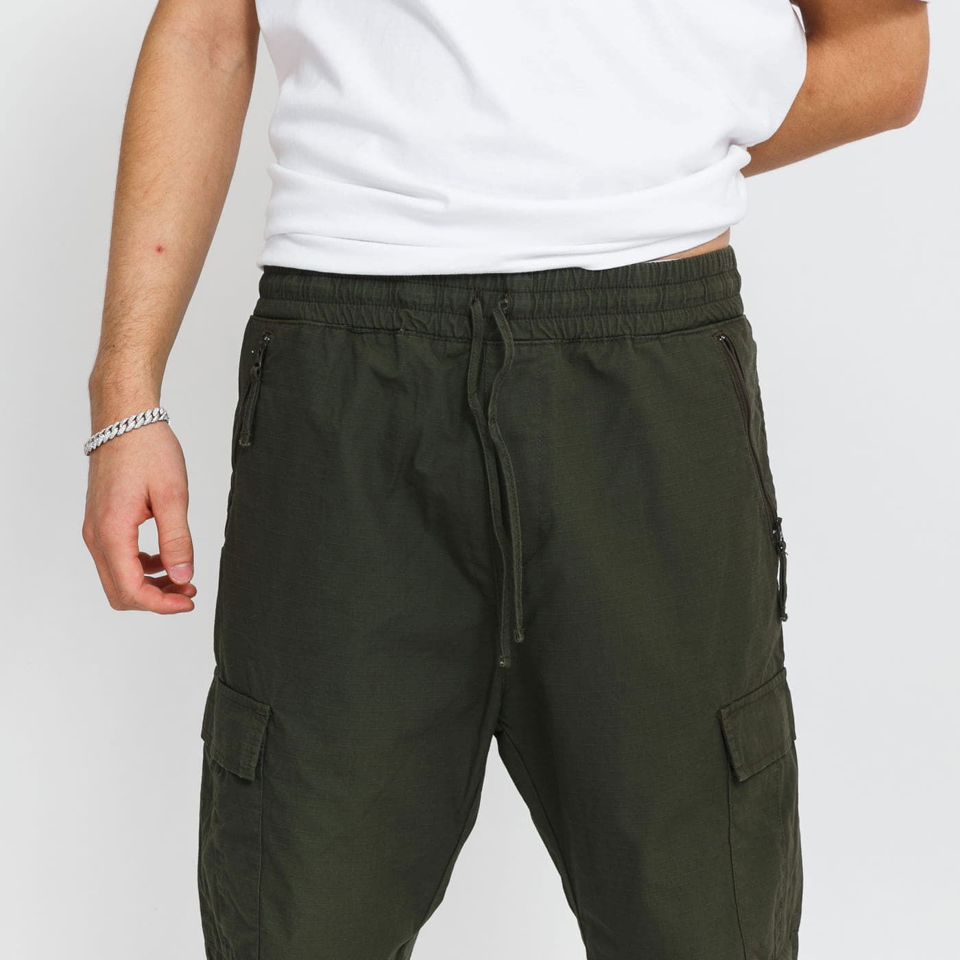 Hlače in kavbojke Carhartt WIP Cargo Jogger Cypress Modra | I025932_63_02, 1