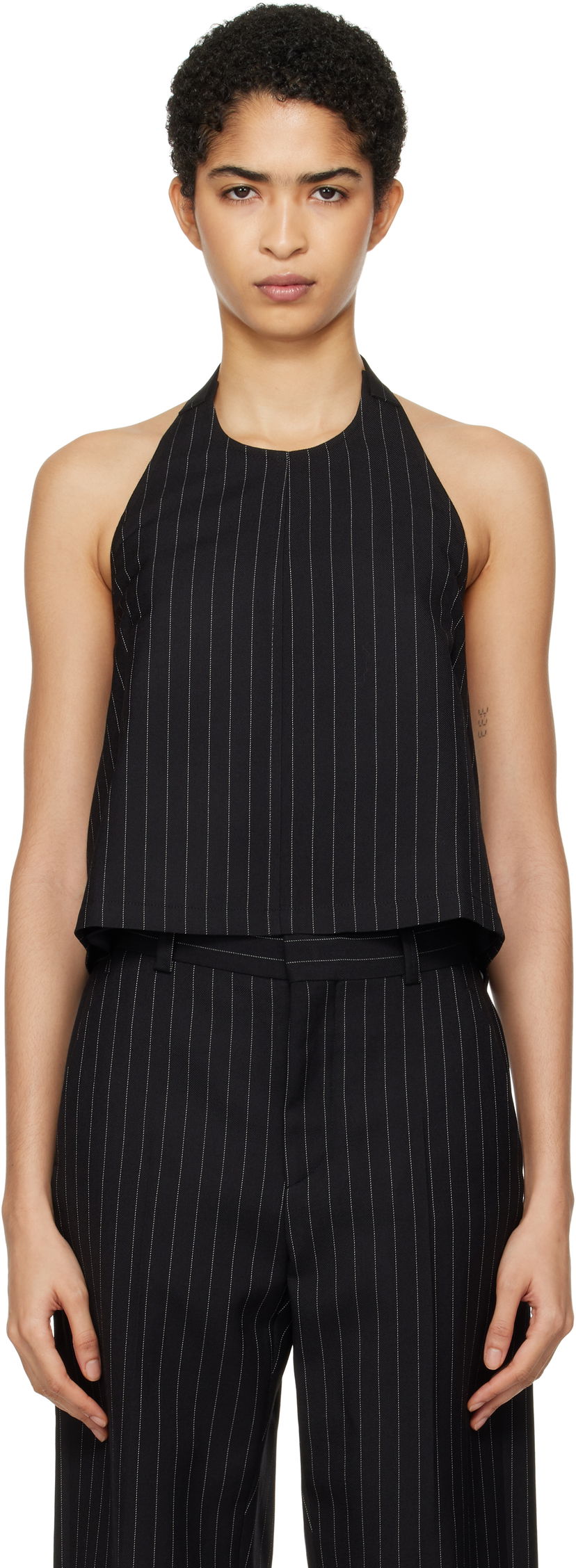 Majica brez rokavov WARDROBE.NYC Pinstripe Backless Halter Top Črna | W1058F24PS
