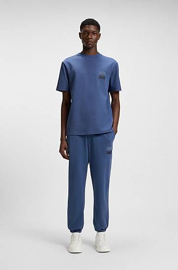 Trenirka BOSS HUGO Cotton-Terry Tracksuit Bottoms with Split Logo Modra | 50542866, 1