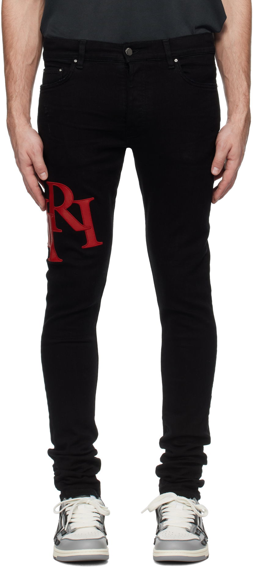 Kavbojke AMIRI Skinny Jeans With Staggered Logo Črna | AMDNSY1114