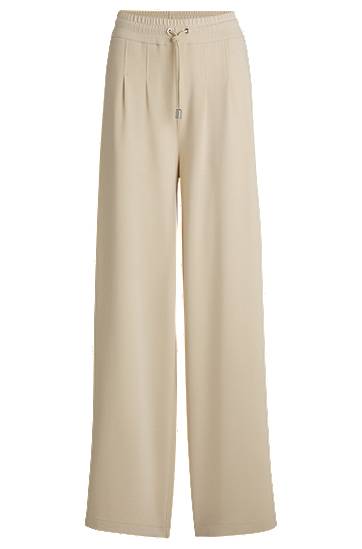 Hlače BOSS Wide-Leg Tracksuit Bottoms with Pleats Bež | 50531832