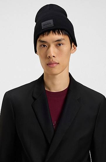 Beanie BOSS Knitted beanie hat in cotton with logo badge Črna | 50551508, 1