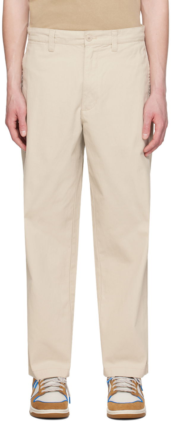 Hlače AAPE by A Bathing Ape AAPE by A Bathing Ape Embroidered Trousers Bež | AAPPTMA677XXMBGE