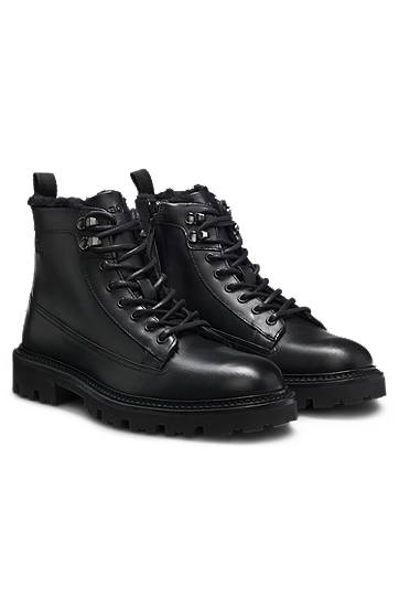Superge in čevlji BOSS Leather lace-up boots with faux-fur lining Črna | 50552570