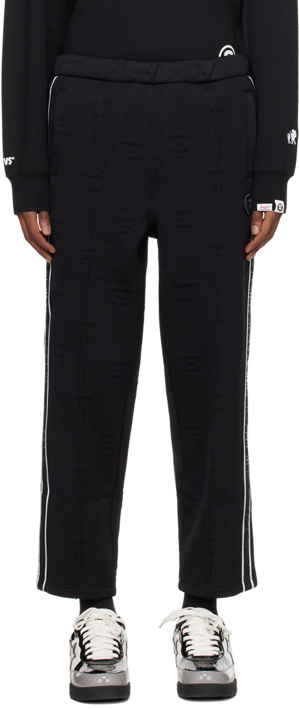 Trenirka AAPE by A Bathing Ape AAPE by A Bathing Ape Jacquard Sweatpants Črna | AAPPTMA644XXLBKX