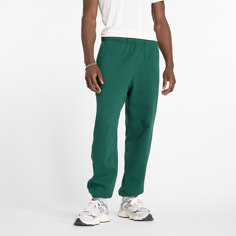 Trenirka New Balance NB Sweatpants Zelena | Pánske nohavice New Balance MP41508NWG – zelené