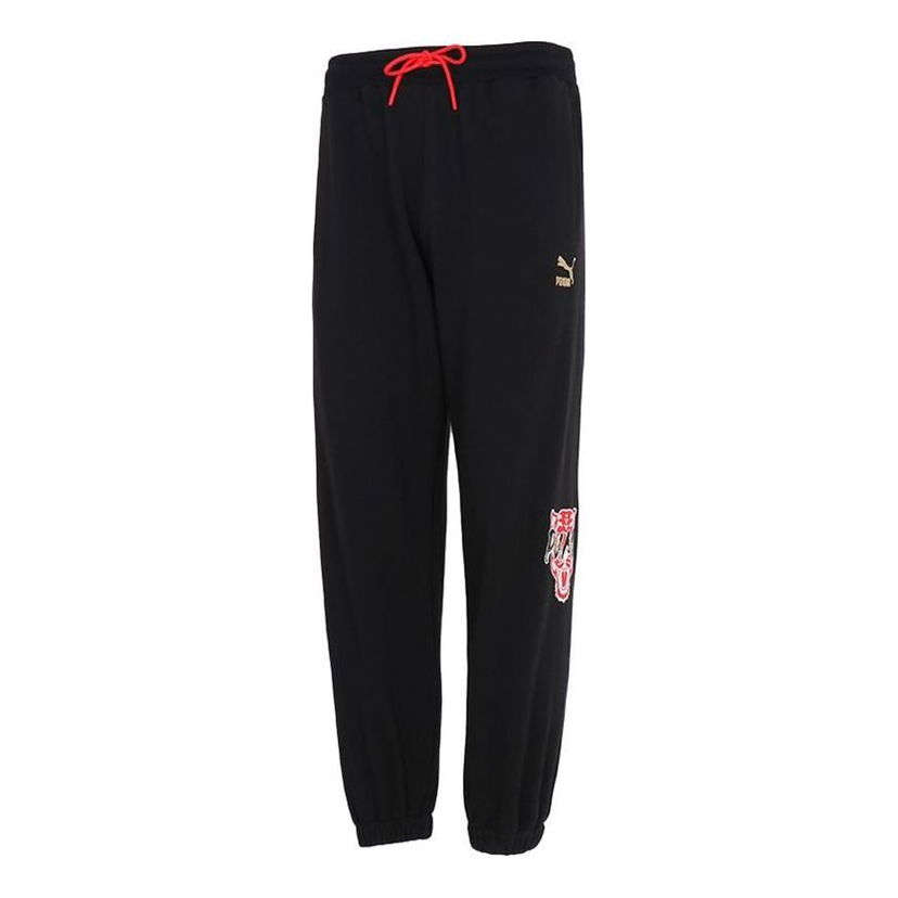 Trenirka Puma Logo Graphic Sweatpants Črna | 536572-01