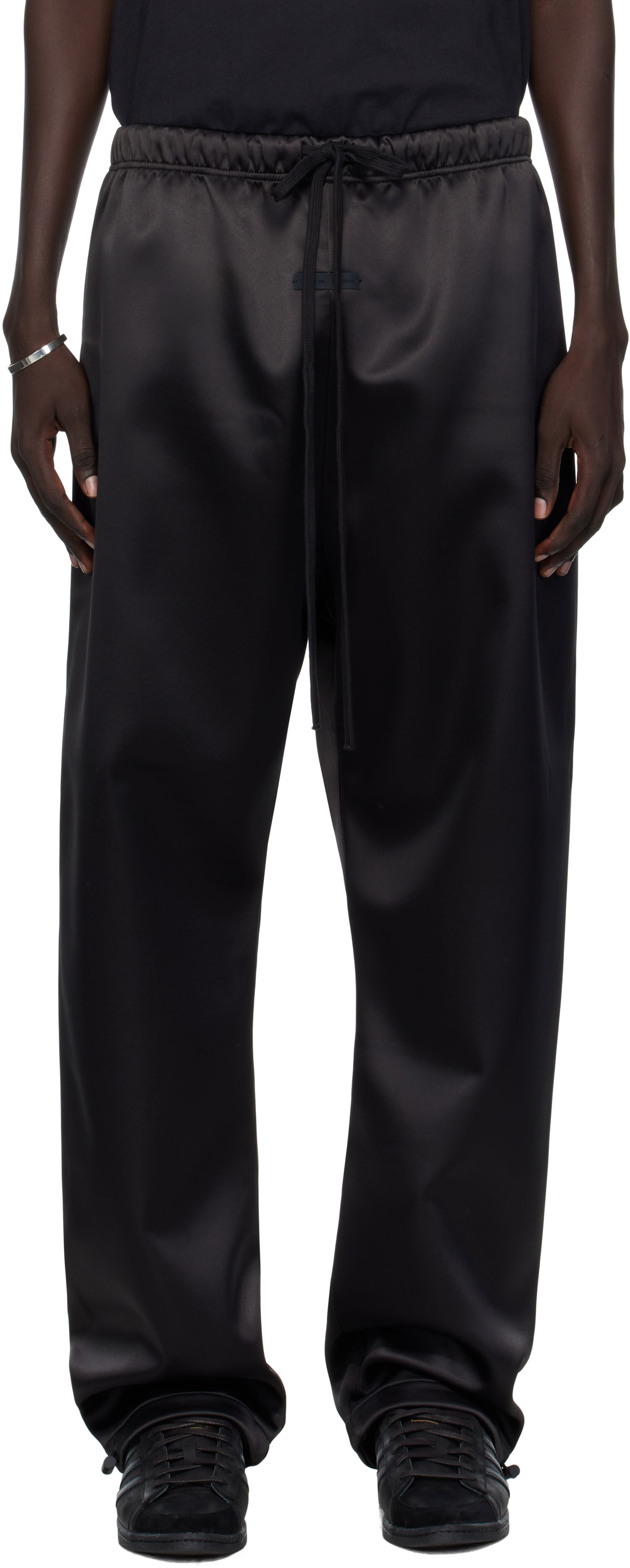 Trenirka Fear of God Fear of God ESSENTIALS Bonded Satin Relaxed Track Pants Črna | 130SP258210F, 0