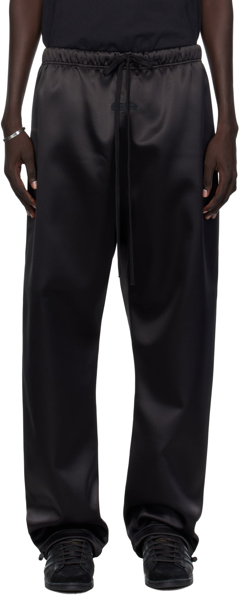 Trenirka Fear of God Fear of God ESSENTIALS Bonded Satin Relaxed Track Pants Črna | 130SP258210F