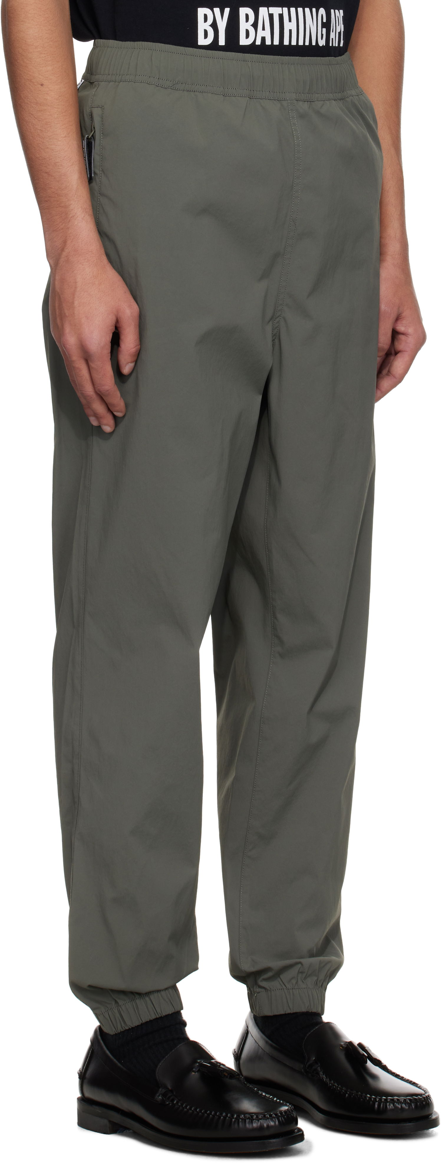 Trenirka AAPE by A Bathing Ape AAPE by A Bathing Ape 'AAPE Now' Woven Sweatpants Zelena | AAPPTMB664XXOKHE, 1