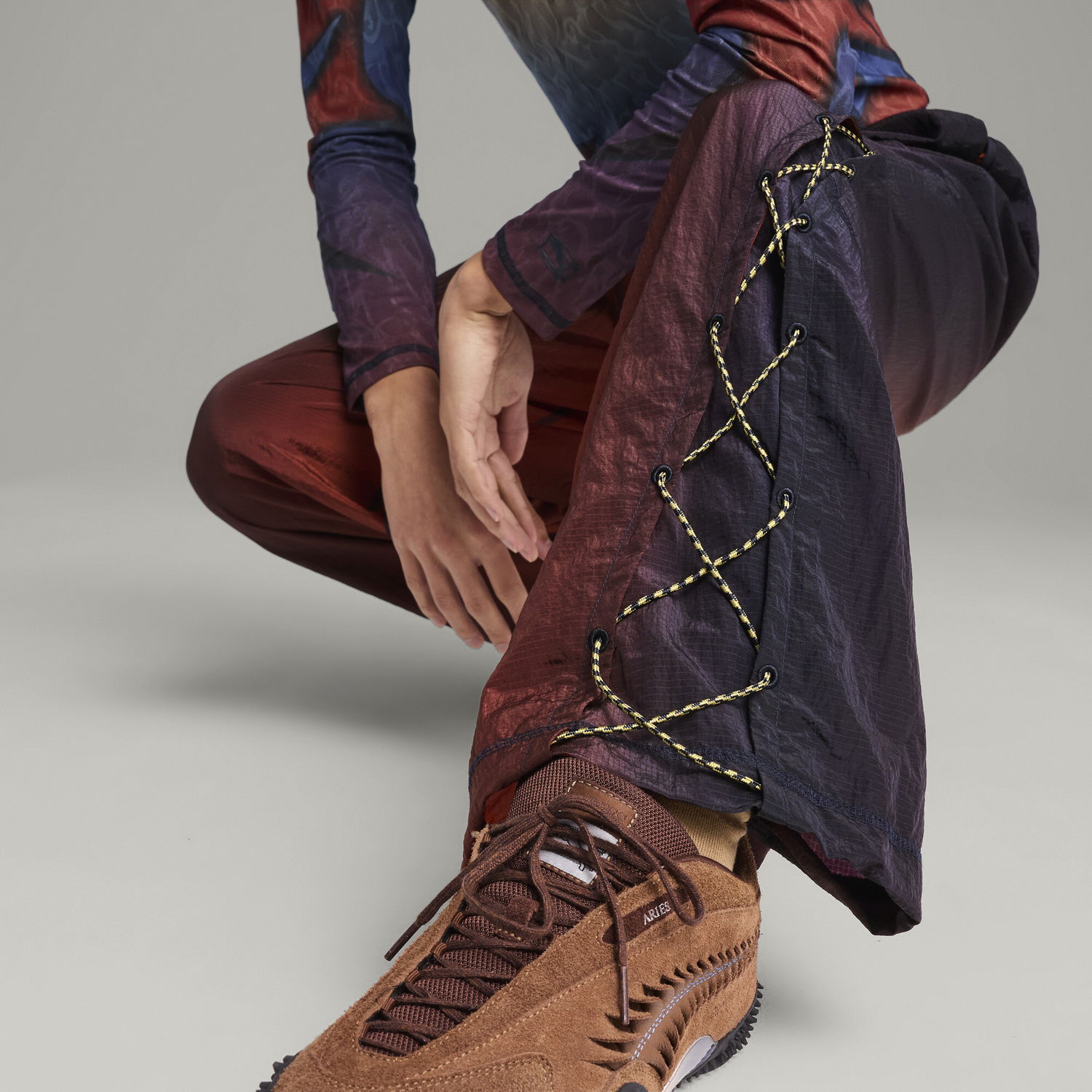 Trenirka Puma ARIES Collaboration Loose Fit Track Pants Rdeča | 629573_52, 1