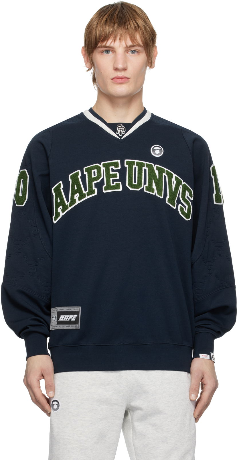 Pleteni pulover AAPE by A Bathing Ape AAPE by A Bathing Ape Main Sweatshirt Mornarica | AAPSWMB364XXNNYX