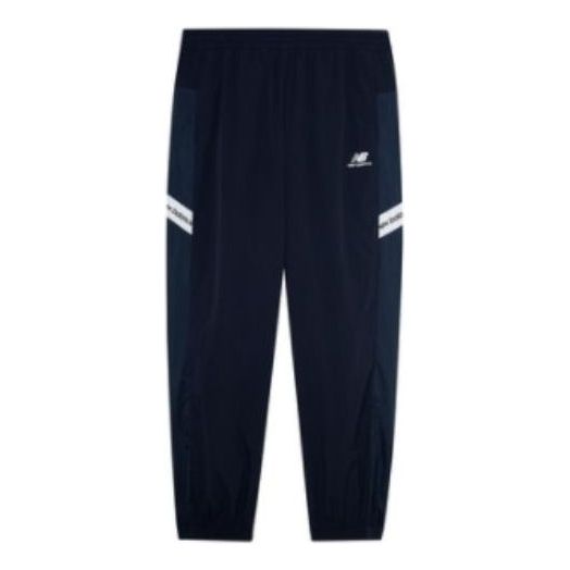 Trenirka New Balance Striped Fleece Joggers Modra | 5TC2U553-NV