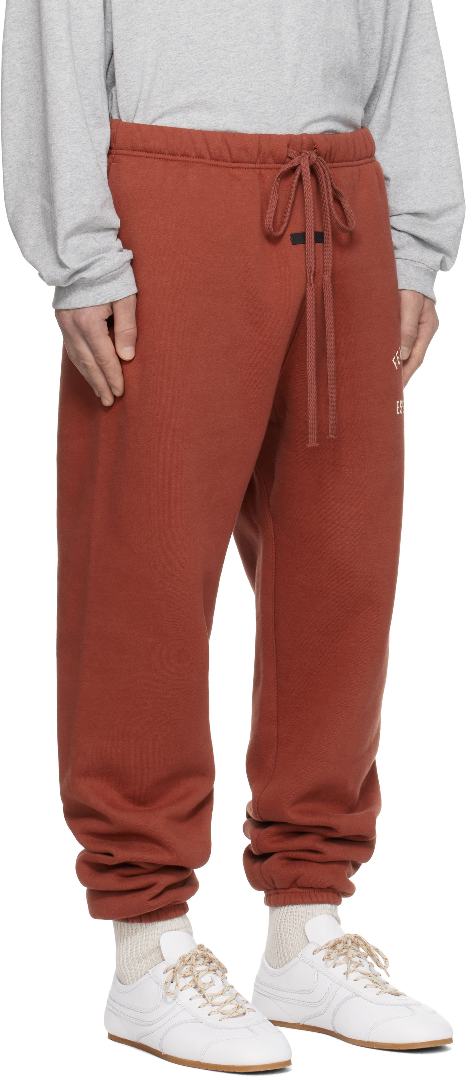 Trenirka Fear of God Fear of God ESSENTIALS Fleece Sweatpants Rdeča | 130HO242026F, 1