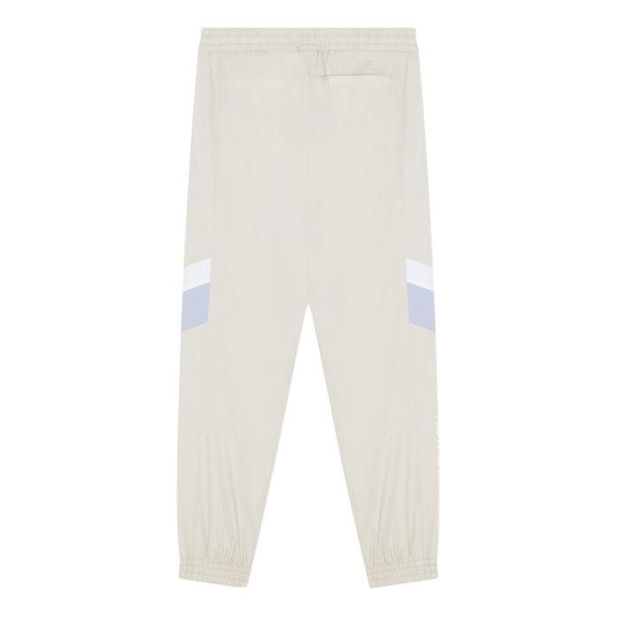 Trenirka New Balance Sportswear Pants Bež | 5TC17133-BEI