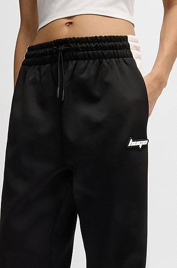 Trenirka BOSS Retro Tracksuit Bottoms with Side Stripe Črna | 50537080, 1