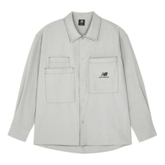 Srajce New Balance Classic Logo Pocket Shirt Siva | AMJ23303-NTP