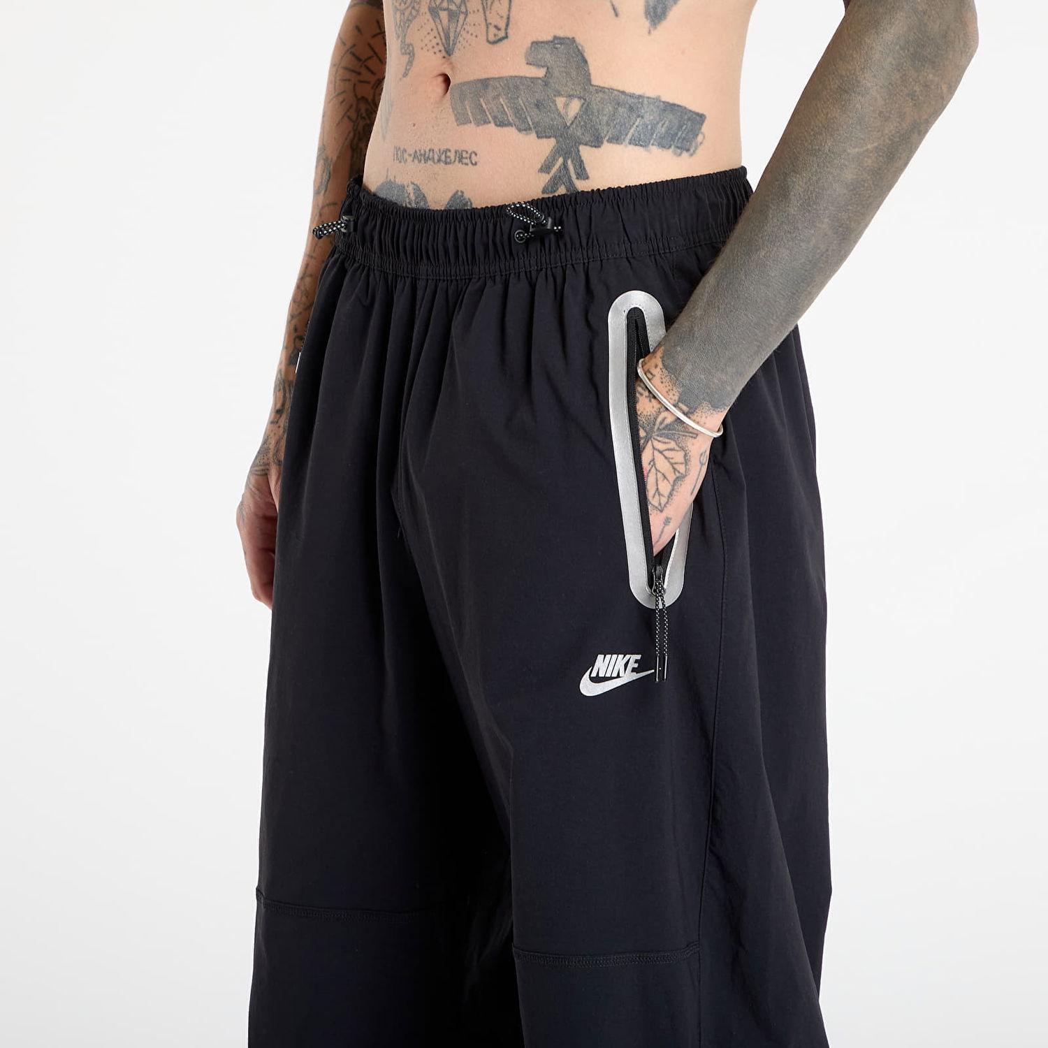 Hlače Nike NRG TECH Woven Pants with Zippered Pockets Črna | IM7259-010, 1