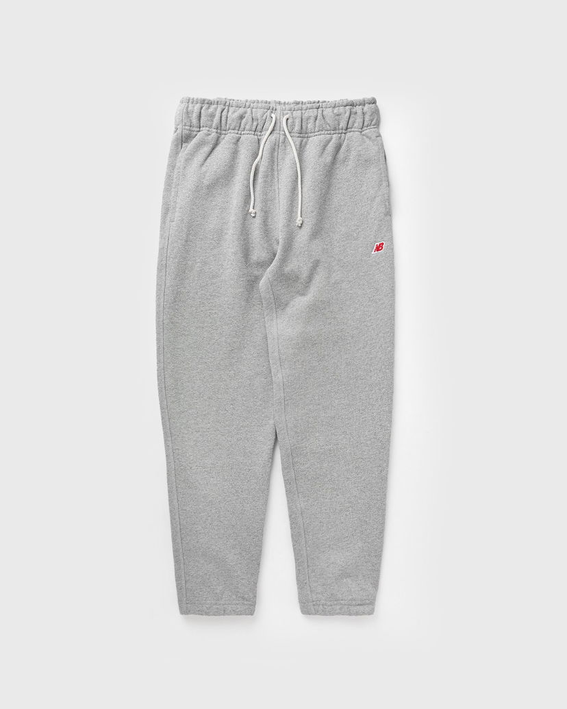Trenirka New Balance Core Sweatpants Siva | MP43547-AG