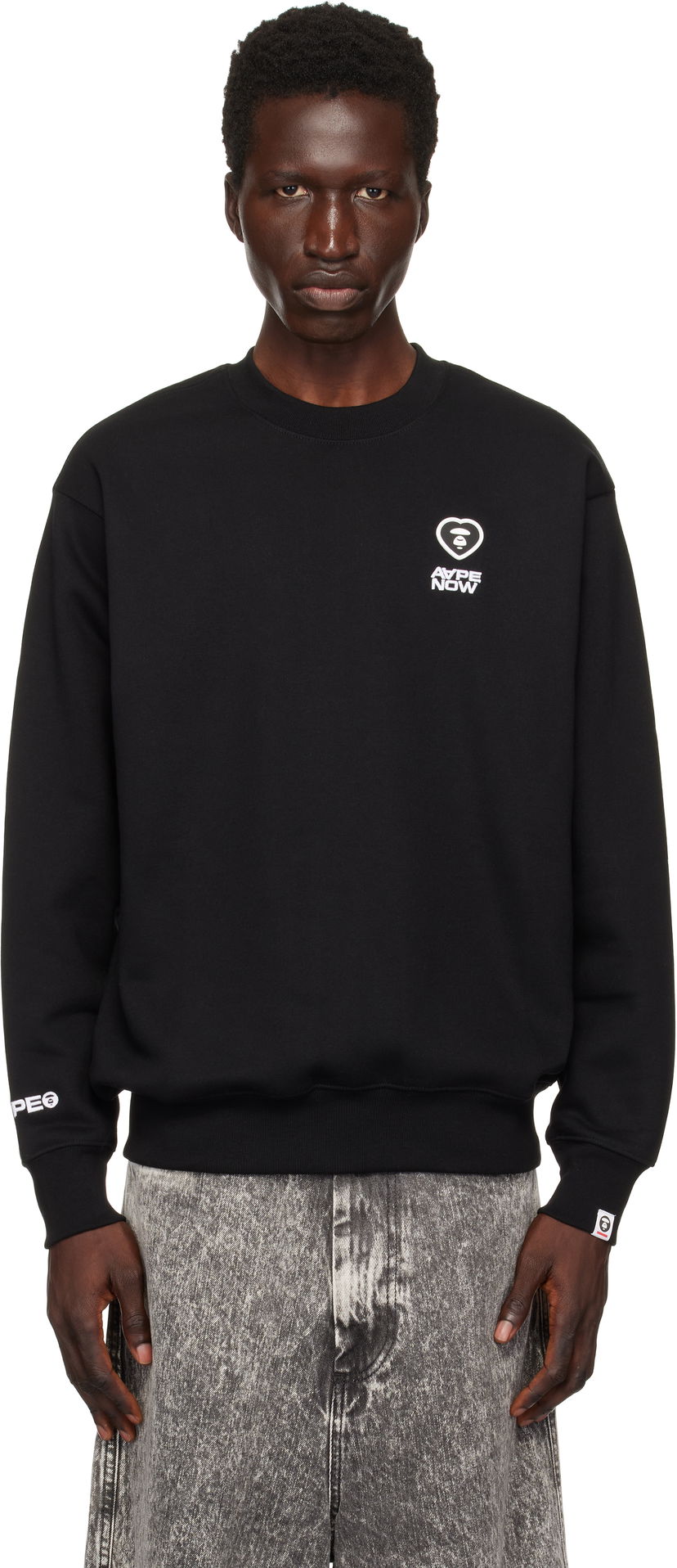 Pleteni pulover AAPE by A Bathing Ape AAPE by A Bathing Ape 'AAPE Now' Sweatshirt Črna | AAPSWMB321XXNBKX