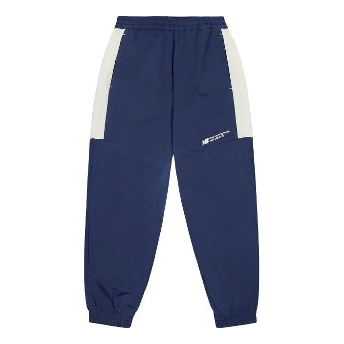 Trenirka New Balance Woven Track Pants Modra | NTE24031-NV