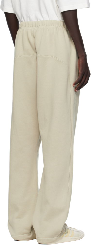 Trenirka Fear of God Fear of God ESSENTIALS Relaxed Fleece Piping Sweatpants Bež | 130SP258066F, 2