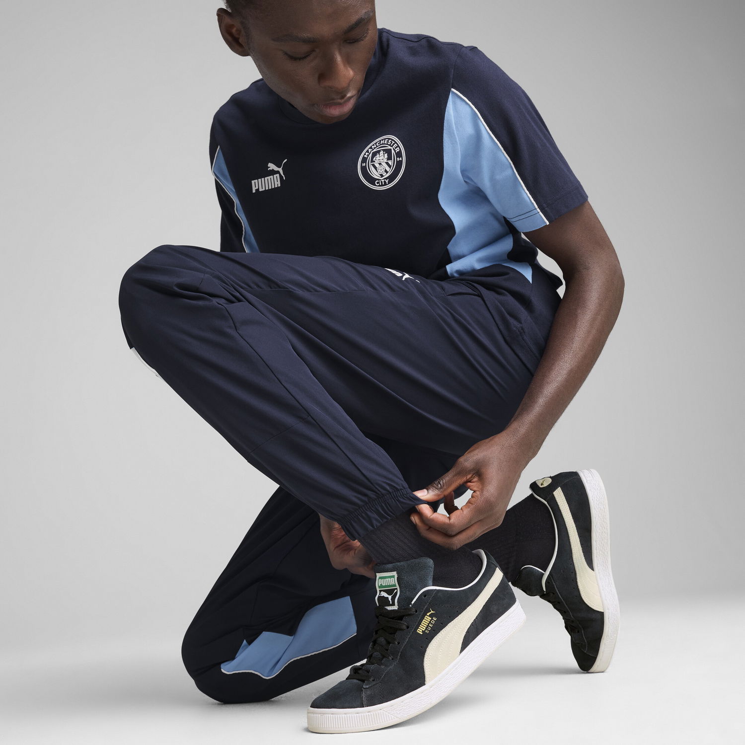Trenirka Puma Manchester City ftblARCHIVE Woven Pants Mornarica | 779132_73, 1