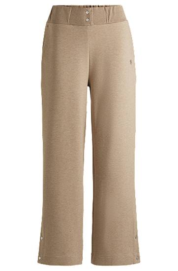 Trenirka BOSS Tracksuit Bottoms with Monogram Bež | 50532017