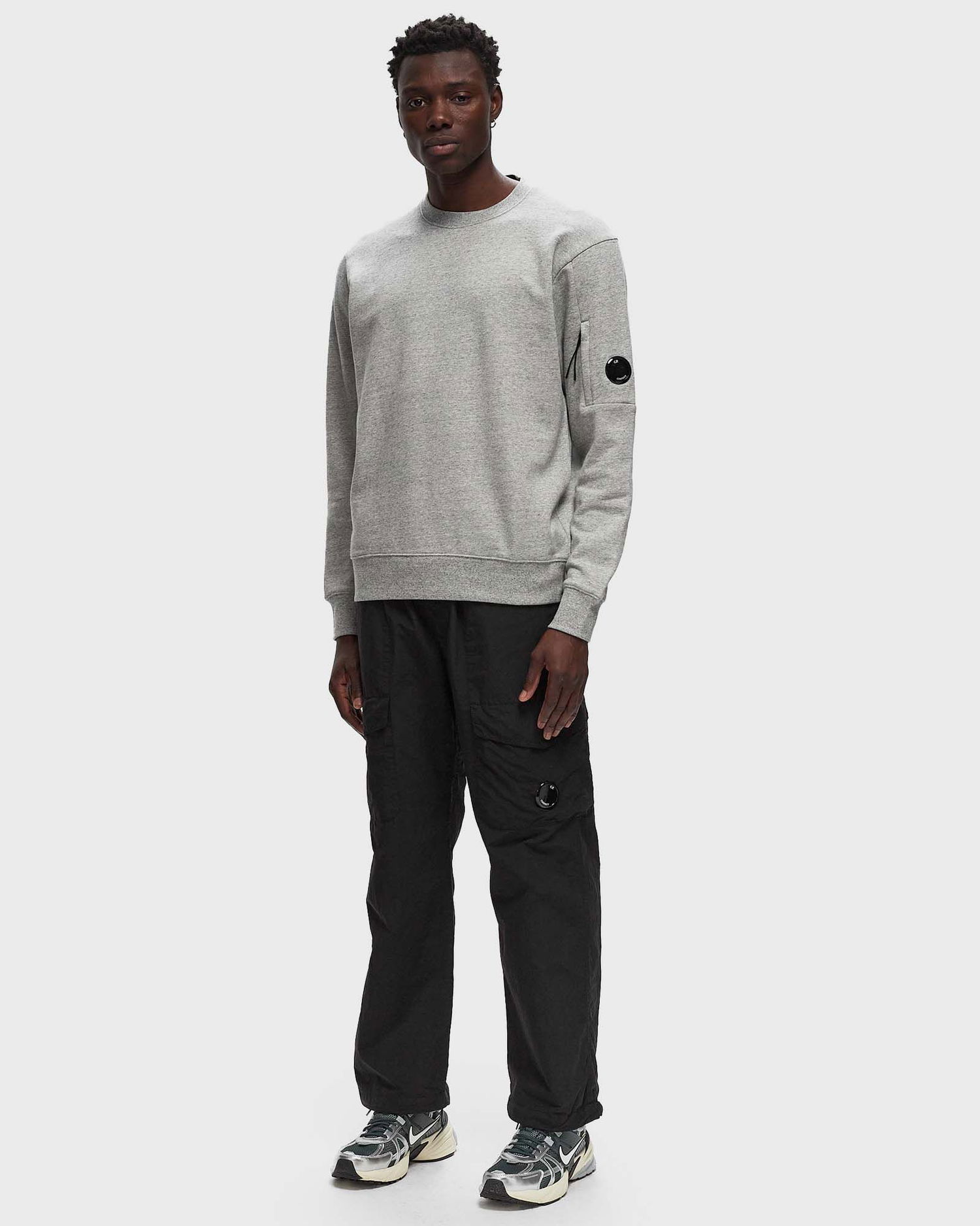 Cargo hlače C.P. Company FLATT NYLON LOOSE UTILITY PANTS Črna | 17CMPA198A005991G-999, 1