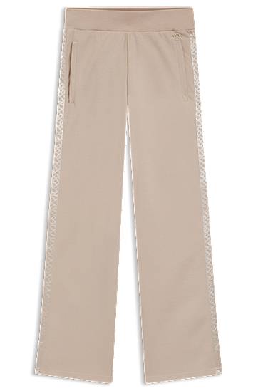 Trenirka BOSS Piqué Jersey Tracksuit Bottoms with Monogram Tape Bež | 50545655